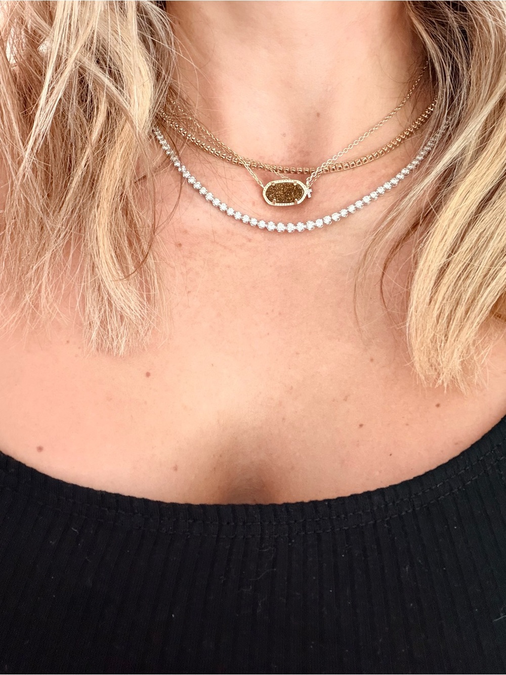 Kendra Scott Gold Druzy Pendant with brown sparkly oval.